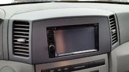 Double Din Navigation Bezel for Jeep Grand Cherokee | Compatible with Jeep Grand Cherokee, 2005-2007; wiring harness and antenna adapter; Grey