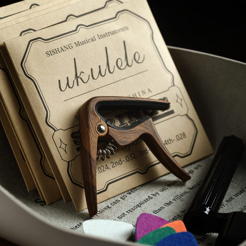 Nylon Ukulele Strings Kit,Include 5 Sets Strings,10 Pieces Ukelele felt picks,Capo and String Winder for Soprano Concert and Tenor Ukele