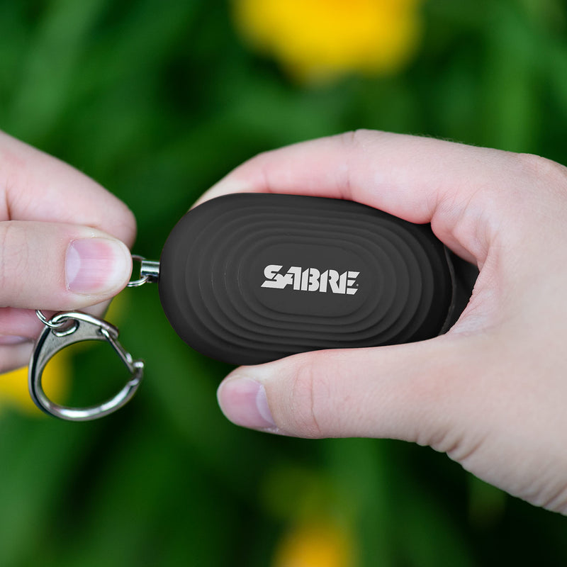 SABRE 2-in-1 Personal Alarm with LED Light, 130dB Personal Safety Siren, Snap Hook for Instant Access, 1,250 Foot (381 Meters) Range, Compact Design for Easy Attachment to Purse, Bag, or Keys Black