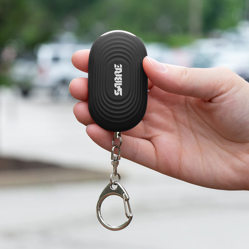 SABRE 2-in-1 Personal Alarm with LED Light, 130dB Personal Safety Siren, Snap Hook for Instant Access, 1,250 Foot (381 Meters) Range, Compact Design for Easy Attachment to Purse, Bag, or Keys Black