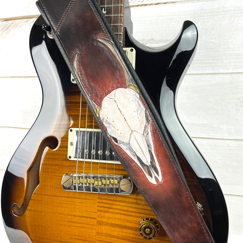 Walker And Williams KB-62 Handmade Carved Longhorn Skull Guitar Strap On Bourbon Brown Leather For Acoustic, Electric, And Bass Guitars
