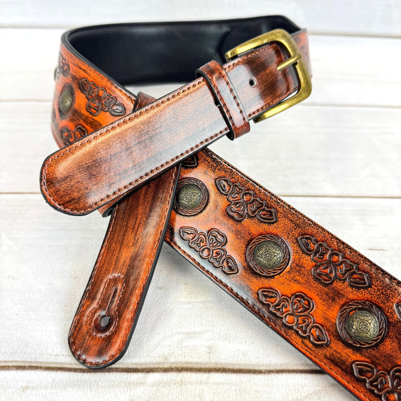 Walker & Williams GE-202 Antique Amber Tan Padded Guitar Strap with Brass Coin Studs, Brass Buckle, And Celtic Tooling For Acoustic, Electric, And Bass Guitars