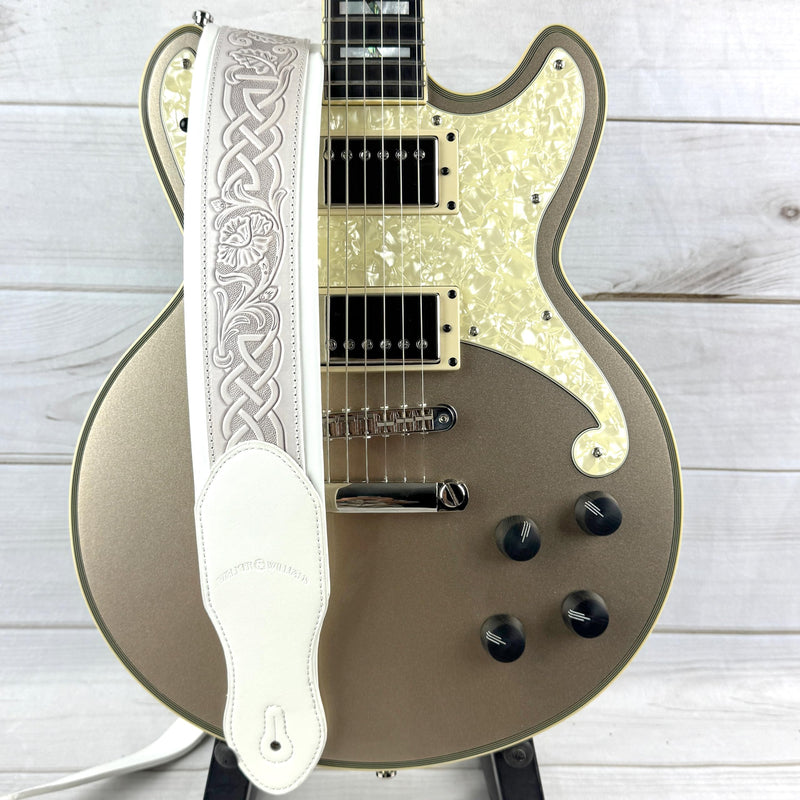Walker And Williams KB-05-WHT Aged White Celtic Knot Full Grain Carving Leather Padded Strap With Arctic White garment leather Backing For Acoustic, Electric, And Bass Guitars