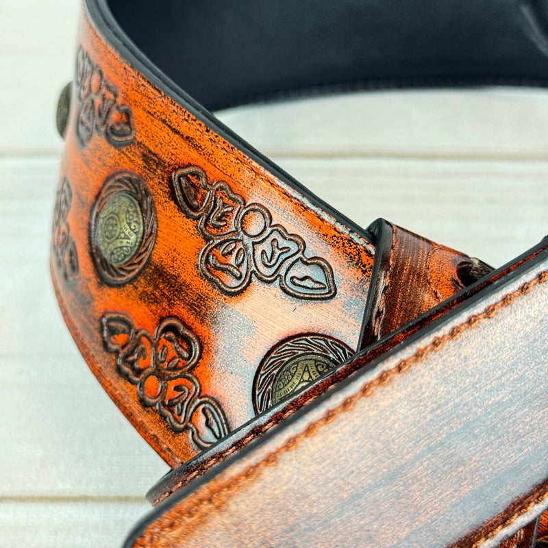 Walker & Williams GE-202 Antique Amber Tan Padded Guitar Strap with Brass Coin Studs, Brass Buckle, And Celtic Tooling For Acoustic, Electric, And Bass Guitars