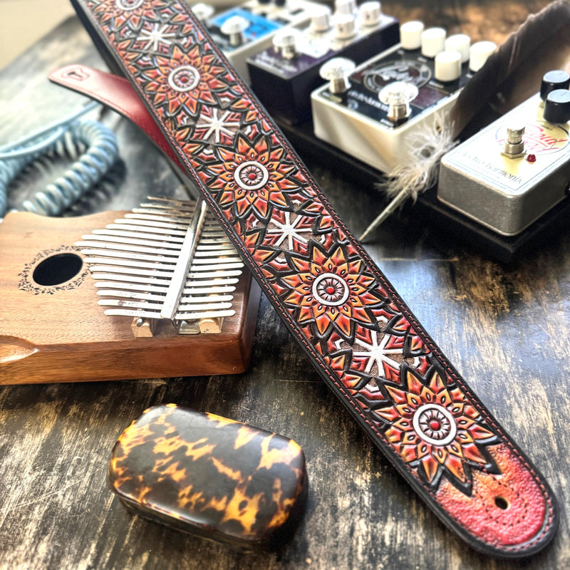 Walker & Williams LIH-3 Cherry Burst Red Hand Carved Premium Leather Guitar Strap With Black Zodiac Star Design And Premium Padded Leather Back For Acoustic, Electric, And Bass Guitars