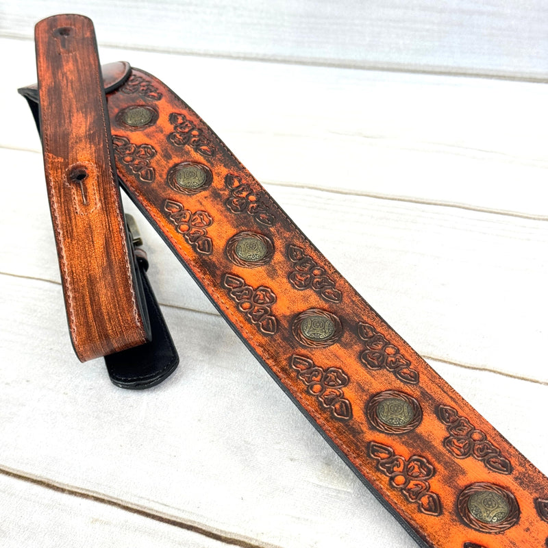 Walker & Williams GE-202 Antique Amber Tan Padded Guitar Strap with Brass Coin Studs, Brass Buckle, And Celtic Tooling For Acoustic, Electric, And Bass Guitars