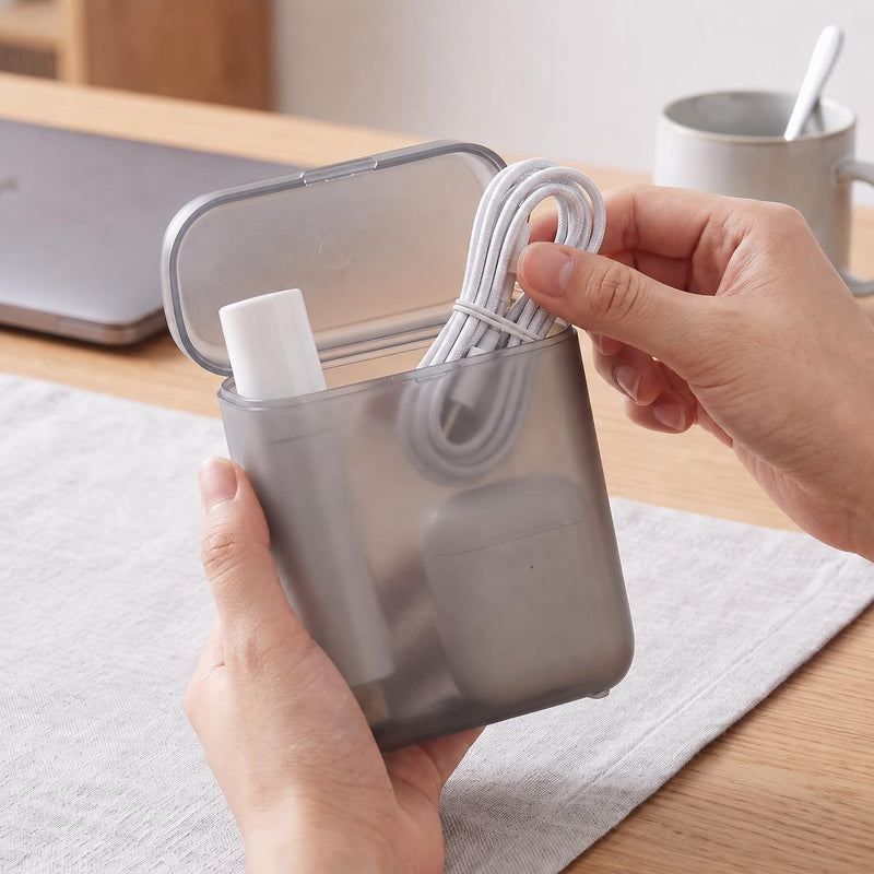1Pcs Portable Cable Organizer Box, Translucent Case for Earbuds Chargers | Compact size, translucent grey finish, Holds chargers, earbuds, USB cables, Perfect for travel bags
