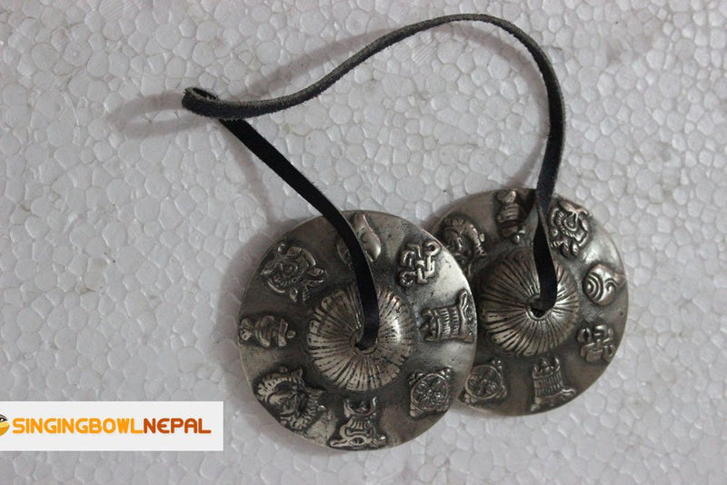 Tibetan Tingsha Meditation Bell - 8 Auspicious Symbols Beautifully Embossed on the Surfaces - Hand Tuned & Crafted in Nepal