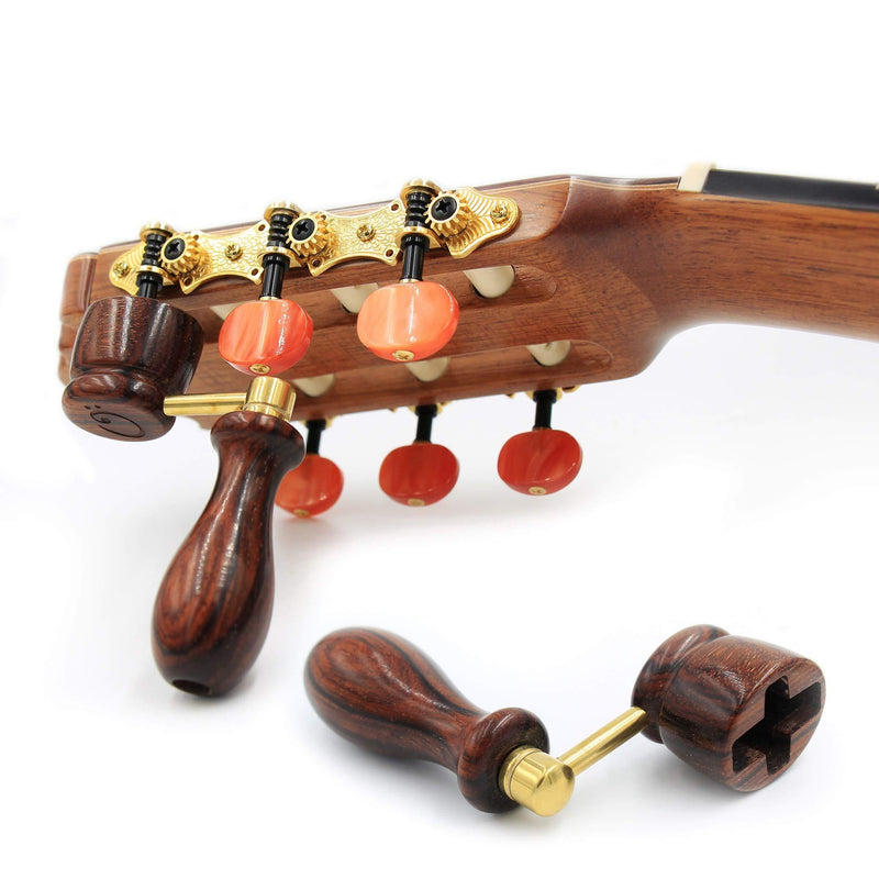 "COCOBOLO" Handcrafted Wooden Guitar String Winder by Tenor. Designed For Classical, Flamenco, Acoustic, Electric Guitars and Ukuleles. Made Of Solid Handpicked COCOBOLO Wood. Beautiful Vintage Look. Cocobolo Wood and Golden Colored Metal Handle.