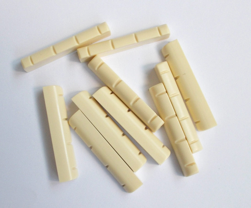 Generic 10 pcs Ukulele Nuts Plastic 35 x 5 x 6.5 Ivory