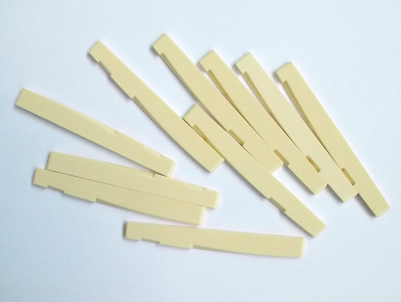 Generic 10 pcs Acoustic Guitar Saddles for 6 String Guitar Plastic Ivory 74 x 3 x 7.8-6.8