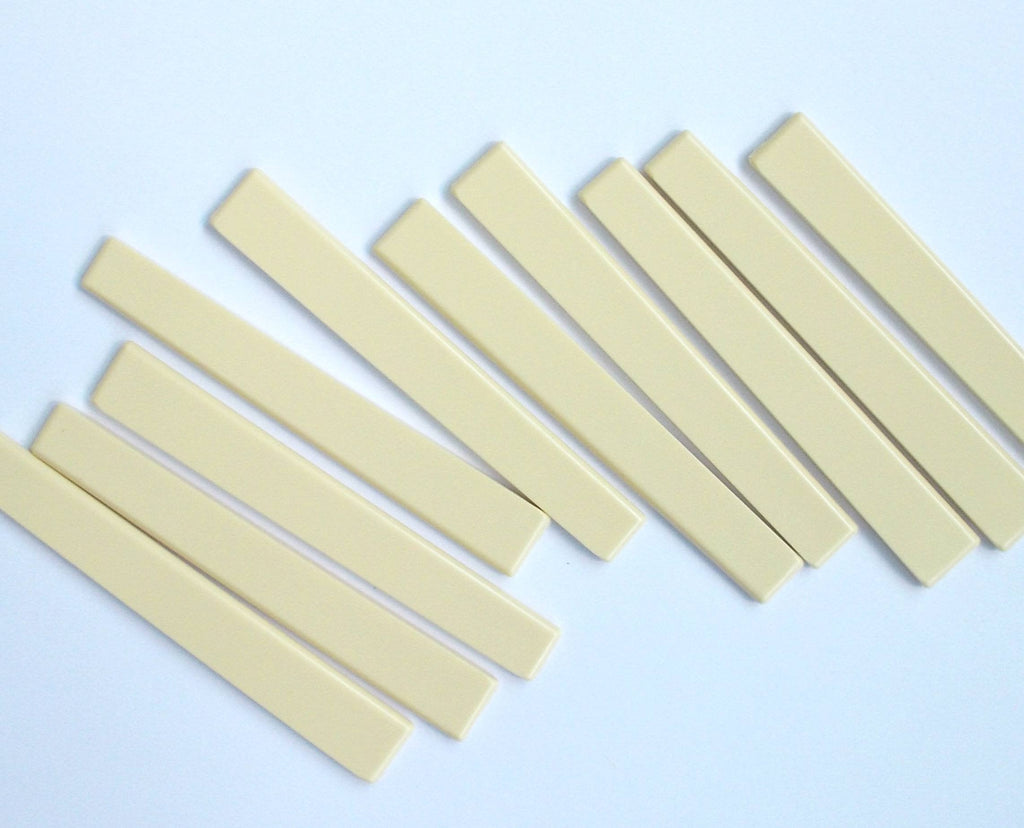 Generic 10 pcs Classical Guitar Saddles Plastic 80 x 3 x 11.3-9.3 Ivory