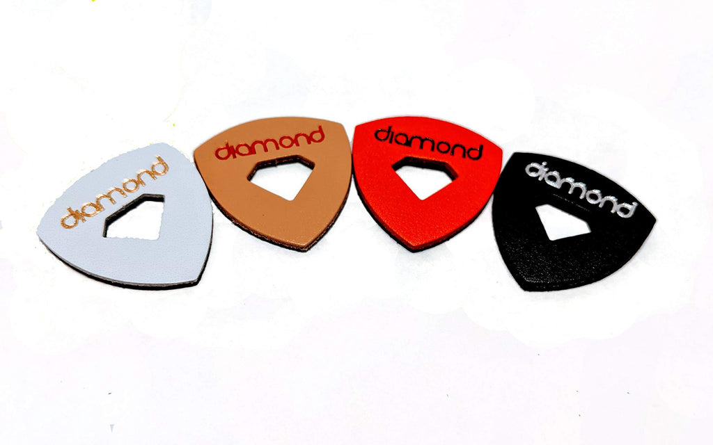 Leather Ukulele Picks with Diamond-Shaped Cutout Hole for Enhanced Grip Never Drop your Pick while Playing also works as a Guitar Pick or Bass Pick Leather 4-Pack