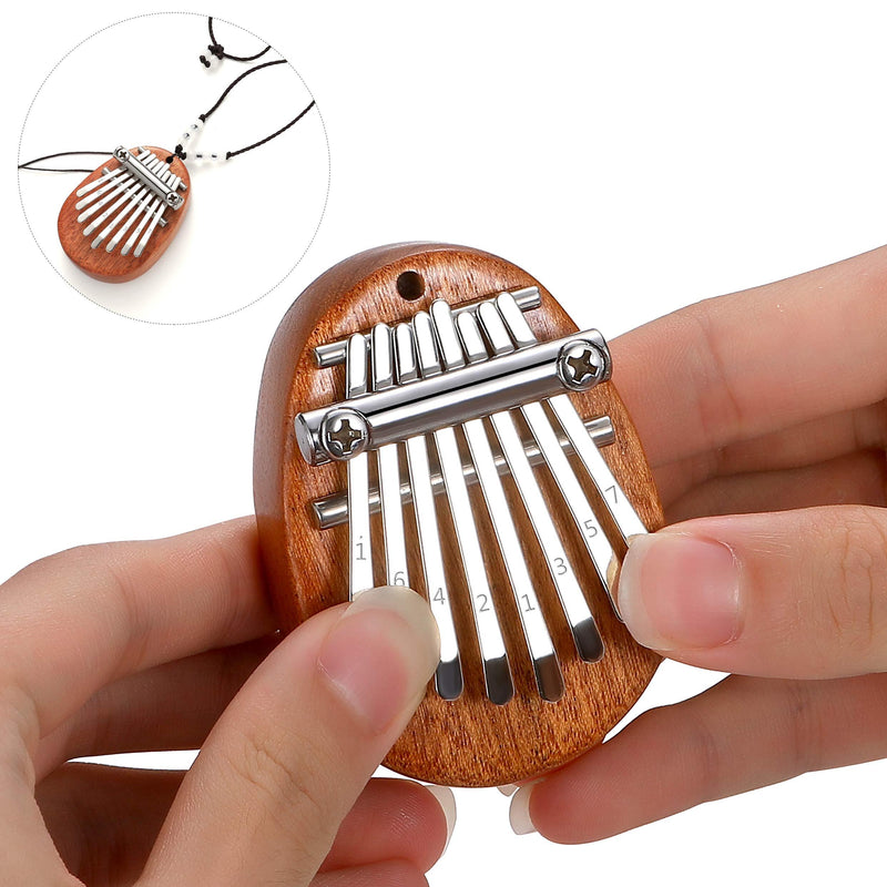 Elejolie Mini Kalimba Thumb Piano 8 Key,Finger Piano Finger Harp Portable Musical Instruments Gift for Kids Adult with Pendant 8key